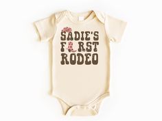 My First Rodeo Baby Bodysuit, Rodeo Birthday, Baby Bodysuit, First Birthday Outfit, Birthday Girl Shirt, First Birthday Shirt, Girl Birthday 💗  Welcome to The WildflowerbyMiley Etsy Shop!  This listing is for the bodysuit, sweatshirt or t-shirt only. All other items that are shown in our photos such as shoes, hats, beanies, blankets etc. are for photo staging purposes and are NOT INCLUDED in the sale. DESCRIPTION:  This baby and children's unisex essential fits like a well-loved favorite. Super First Birthday Shirt Boy, Rodeo Baby, First Birthday Shirt, Birthday Boy Shirt, My First Rodeo, Rodeo Birthday, Pregnancy Announcement Photos, Outfit Birthday, First Rodeo