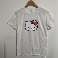 Hello Kitty Women T-Shirt Sise Sp . Ptp17.5”Length 25.5” Material 100% Cotton. Hello Kitty Tshirt, Hello Kitty T Shirt, Baggy T-shirt, Kitty Clothes, Hello Kitty Clothes, Women T Shirt, Cat Tshirt, Christmas List, White Shirt