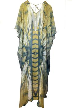 Freya Ashtanga Kaftan, this beautiful v-neck printed caftan in pure silk is cut oversized for an elegant drape and voluminous movement. Featuring a deep v-neckline and adjustable tie at the back. This dress can be transformed from day to night. Wear it as evening wear or as part of your beach outfit. 100% Silk Dry clean Handmade in Ireland FREYA PRINT: A dragonfly inspired print with shiny, iridescent, delicate and intricate wings in an ombre palette of metallics, antique gold, copper, bronze, c Chic Silk V-neck Kaftan, Chic Silk Kaftan For Beach Cover-up, Elegant V-neck Kaftan For Vacation, V-neck Printed Kimono For Festivals, Chic Printed V-neck Kaftan, Silk V-neck Kaftan For Beachwear, Flowy V-neck Kaftan For Beach Cover-up, Silk V-neck Beachwear Dress, Yellow Bohemian V-neck Kimono