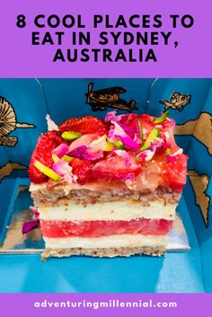 a piece of cake with strawberries on top and the words 8 cool places to eat in sydney, australia