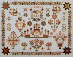 a cross stitch pattern with flowers and crosses on it's border, as well as the