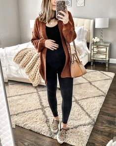 IG: @mrscasual | Rust sweater, black tee, black leggings, givenchy tote, & leopard sneakers Prego Outfits, Pregnant Outfit, Fall Maternity Outfits, Casual Maternity Outfits, Winter Maternity Outfits, Winter Mode Outfits, Trendy Maternity Outfits, Baby Bump Style, Preggo Fashion