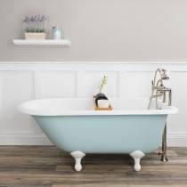 a bathroom with a claw foot tub and white walls, wood flooring and wooden floors