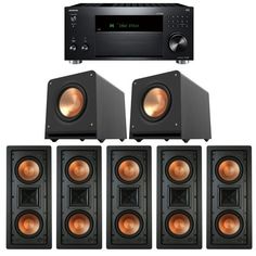 the home theater system has five speakers and two subwoofers, one is black