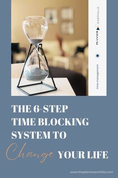 an hourglass sitting on top of a table with the words, the 6 - step time blocking system to change your life