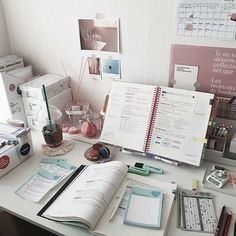 an open book sitting on top of a desk