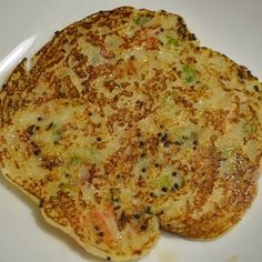 two cooked food items on a white plate