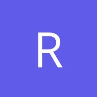 the letter r is shown in white on a purple background