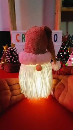 a santa hat and beard light up the table