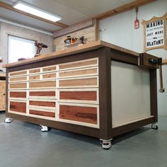 a workbench made out of wood in a garage