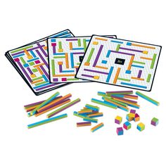 three pieces of colored stick art on a white background with text that reads,'color block puzzles '