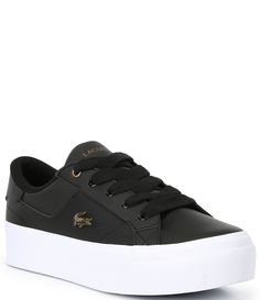 From Lacoste, the Women's Ziane Platform Leather Sneakers feature:Leather upperChunky lacesMetal hardware crocodile logo at sideAdjustable lace up front closureMesh liningRubber foxing outsoleFlat heelImported. Lacoste Sneakers Women, Lacoste Shoes Women, Lacoste Sneakers, René Lacoste, Crocodile Logo, Chanel Sneakers, Lacoste Women, Dillard's, Logo Embroidered