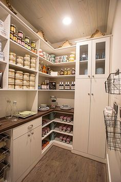 an organized pantry with lots of food in it