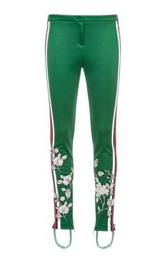 A green technical jersey stirrup legging. The bottom is enhanced with floral appliqués over the rmia bags/red Web down the sides. The activewear collection continues to be an important trend and is further enhanced by embroidered details. Green technical jersey. RTW Embroidered floral appliqués on the bottom. Stirrup hem. Skinny leg. Sits low on the waist. 55% polyester, 45% cotton. Made in Italy Leggings Gucci, Embroidered Leggings, Gucci Runway, Gucci Pants, Embroidered Tulle Dress, Stirrup Leggings, Red Web, Embroidered Denim Jacket, Legging Pants