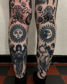 the legs are covered with tattoos and designs