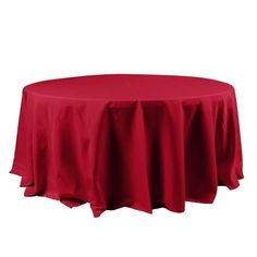 a round table with a red cloth on it