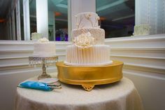 a wedding cake sitting on top of a table