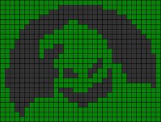 a green and black cross stitch pattern with the letter c in it's center