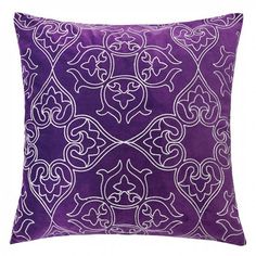 a purple and white pillow with an intricate design on the front, in square shape