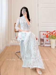 🌻This listing is for 1 long dress Pre-made ao dai (Vietnamese long dress) for women/girls. Material: Double layers voan/silk - Stretchy level : 0/10 🌻 The measurement of this ao dai (long dress) is in Vietnamese size (American size tends to be bigger for the same size). Please LOOK AT THE SIZE CHART CAREFULLY BEFORE ORDERING. There might have some chalk writings on the fabric due to making process. These marks can be washed away easily. 🌻🌻No returns or exchanges Buyer can contact seller about any issues with an order. 🌸 Follow us Facebook/aodaiemily www.aodaiemily.com 💜 Thank you very much!💜 Blue Maxi Length Spring Sets, Summer Wedding Long Ao Dai, Summer Wedding Ao Dai In Maxi Length, Blue Ao Dai For Spring Party, Summer Wedding Ao Dai With Long Sleeves, Fitted Light Blue Ao Dai For Spring, Blue Floor-length Ao Dai For Wedding, Traditional Ao Dai For Spring Party, Long Blue Ao Dai For Spring