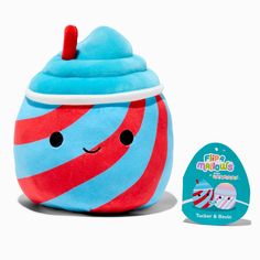 a blue and red striped cupcake plush toy next to a sticker that says fifi's mallus