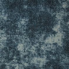 an abstract blue and white background with lots of small dots on it's surface