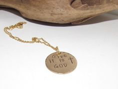 Gold tone give it to God necklace , baptism necklace , confirmation gift,  This brass Nugold charm comes on a stainless steel and gold  plated chain,  in a                                                   1 1/8 size gold disk . It is a perfect gift for many occasions  PLEASE NOTE: These pieces are hand stamped. They are not machine made. Each letter is stamp one at a time, by hand. Part of the charm of hand stamped jewelry is that the letters are not always perfectly straight. Please do not consider these imperfections as defects, but as part of the character of the piece. To purchase this item , pay for item and submit your wording design , work will not begin until payment is received do to the custom nature of each product. * CUSTOM ORDERS ALWAYS WELCOME JUST MESSAGE USE FOR YOUR CUSTO Gold Inspirational Hand Stamped Charm Necklace, Inspirational Gold Hand Stamped Charm Necklace, God Necklace, Give It To God, Mom Stuff, Gold Disc, Confirmation Gifts, Hand Stamped Jewelry, Baptism Gifts