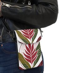 Crossbody Cell Phone Wallet Purse, Floral Line Art Print 8333. This crossbody shoulder bag is compact and adds a splash of style. It comes in one size (7.5" x 4.9") and features an extendable faux leather strap (29.6" to 51.2"). Two main compartments have a flip-up cover—one for a phone and three hidden ones for regular size cards. Made from high-grade microfiber leather. ● High-grade faux leather ● One size: 7.5" × 4.9" × 1" (19cm × 12.5cm × 2.5cm) ● Detachable, adjustable faux leather strap (29.6" to 51.2") ● 2 main flip-up compartments with 1 pocket and 3 hidden card slots ● Black microfiber leather back ● Lightweight and compact White Crossbody Phone Bag For On-the-go, Modern Crossbody Shoulder Bag With Card Slots, Floral Line Art, Cell Phone Wallet, Cell Phone Purse, Phone Purse, Phone Wallet, Small Bags, Crossbody Shoulder Bag