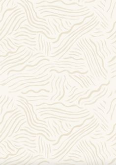 a white and beige wallpaper with wavy lines on the surface, as well as a pattern