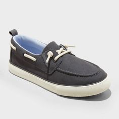 Your child will love elevating their casual style in these Reece Boat Shoes from Cat & Jack™. Featuring a classic round-toe design, these medium-width boat shoes are a slip on style with gores. Featuring a 100% textile insole for comfortable wear, these boat shoes feature a pull-on tab on the back for easy on and off. Cat & Jack™: Kids’ clothing with an imagination of its own. Construction For Kids, Plastic Heels, Footbed Sandals, Rubber Shoes, Toe Designs, Cat & Jack, Charcoal Gray, Slip On Sneakers, Kids Clothing