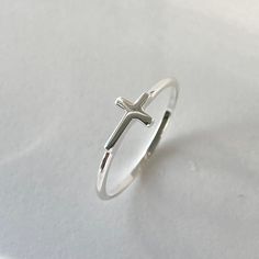 *  Perfect gift idea for any occasion: birthday, anniversary, engagement, graduation, bridesmaid, Mother's Day, Valentine's Day, Christmas, promise. *  Sterling Silver Tiny Sideway High Polish Cross Ring, Dainty Ring, Silver Ring, Statement Ring, Love Ring, God Ring, Religious Ring. Face Height: 5 mm Finish: High Polish Material: 925 Sterling Silver *  Your purchase includes a gift box come. Let us know if this is a gift and we can ship directly to the recipient and include a personalized note. Rope Ring, Tiny Cross, Rope Rings, Casual Jewelry, Cross Ring, Cute Rings, Ring Promise, Love Ring, Dainty Ring