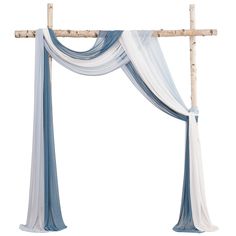 a wooden cross decorated with white and blue drapes