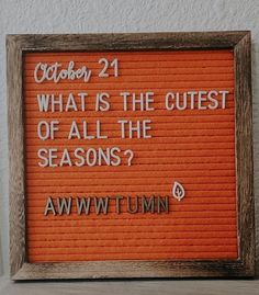 an orange sign that says, what is the cutest of all the seasons?