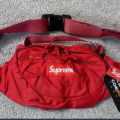 Red Supreme Offer Accepted Red Bag With Pockets For Everyday Use, Red Bags With Pockets For Everyday Use, Red Everyday Bag With Pockets, Functional Red Bags With Pockets, Red Shoulder Bag With Pockets For Shopping, Red Bags With Pockets For Daily Use, Red Rectangular Shoulder Bag With Pockets, Red Satchel Bag With Pockets, Designer Red Bags For Errands