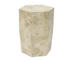 a white marble vase sitting on top of a table