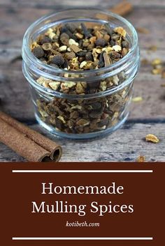 homemade mulling spices in a glass jar with cinnamon sticks