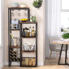 a room with a table, chairs and shelves filled with wine bottles on top of them