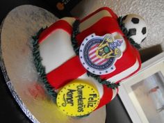 a soccer themed cake on top of a table