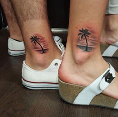 two people with matching tattoos on their feet, one has a palm tree and the other has a beach ball