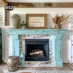 an old fireplace is painted blue with white paint