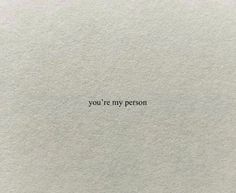 the words you're my person are written in black ink on white paper,