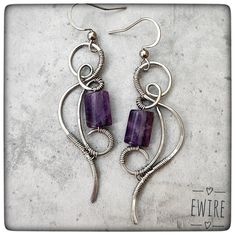 "The jewelry is delivered by Fedex, the delivery time is 3-4 working days! I bent these earrings from stainless steel wire. The wire type is 316L surgical metal wire. I decorated it with a 10 mm amethyste gemstone beads. The lever back closure is stainless steel, but not 316L. The high-gloss steel wire I use is a great alternative to silver wire.  It has a deeper gray color than silver.  However, this color is hereditary, does not change.  It does not oxidize, blacken, or discolor.  It gives a very stable jewelry shape.       Parameters: Total height appr.: 6 cm.(2.2\") I will send the jewel in bubble wrap or in a small box. You can find more earrings from me here: https://www.etsy.com/shop/EWirehu?ref=search_shop_redirect&section_id=28201898 Thank you for your visit!" Pierced Dangle Earrings With Wire, Unique Nickel-free Wire Earrings, Silver Dangle Wire Earrings, Silver Wire Dangle Wrap Earrings, Nickel-free Metal Wrap Earrings As Gift, Nickel Free Metal Wrap Earrings As Gift, Silver Wire Wrap Dangle Earrings, Nickel-free Metal Wrap Earrings For Gift, Nickel Free Silver Wire Earrings