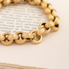 Talk about Georgian-era chain vibes! This rolo chain is incredibly charming - and such a big and bold look on the wrist as well. Each is beautifully textured for a look that is both vintage in feel and elegant. The links are also perfect for hanging charms! 18kt yellow gold, and measures 8.8" in length (we can adjust the length as needed). Please see qualitative report for more information.