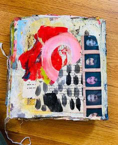 an altered book with some pictures on it