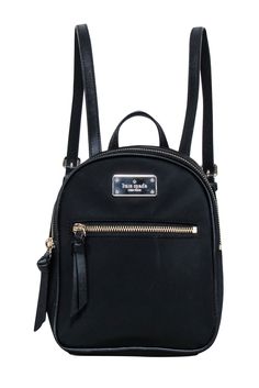 Be ready for any adventure with the Kate Spade black nylon mini backpack. Perfect for a weekend getaway, this backpack stores all your essentials in style. From hiking to picnics, it's a must-have for any fun-filled excursion. 100% Nylon Fabric lining Logo plaque front Top zipper closure Front exterior zipper pocket Adjustable straps Height 8.25" Width 6.5" Depth 3.5" Functional Backpack With Zipper For Weekend Trips, Kate Spade Travel Bags With Zipper Closure, Kate Spade Backpack With Zipper Closure, Kate Spade School Backpack With Adjustable Strap, Kate Spade School Backpack, Trendy Kate Spade Standard Backpack, Trendy Kate Spade Backpack, Backpack For Weekend Trips, Backpack For Weekend Trips And Back To School