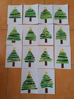 six christmas trees made out of construction paper