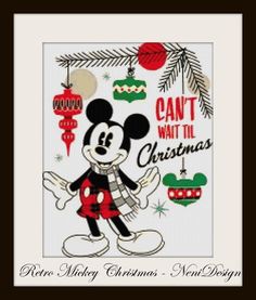 a cross stitch christmas card with mickey mouse