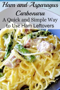 ham and asparagus carbonara recipe on a blue plate with text overlay