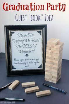 a pile of wooden blocks sitting next to a framed sign