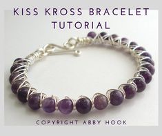 a bracelet with purple beads and silver wire